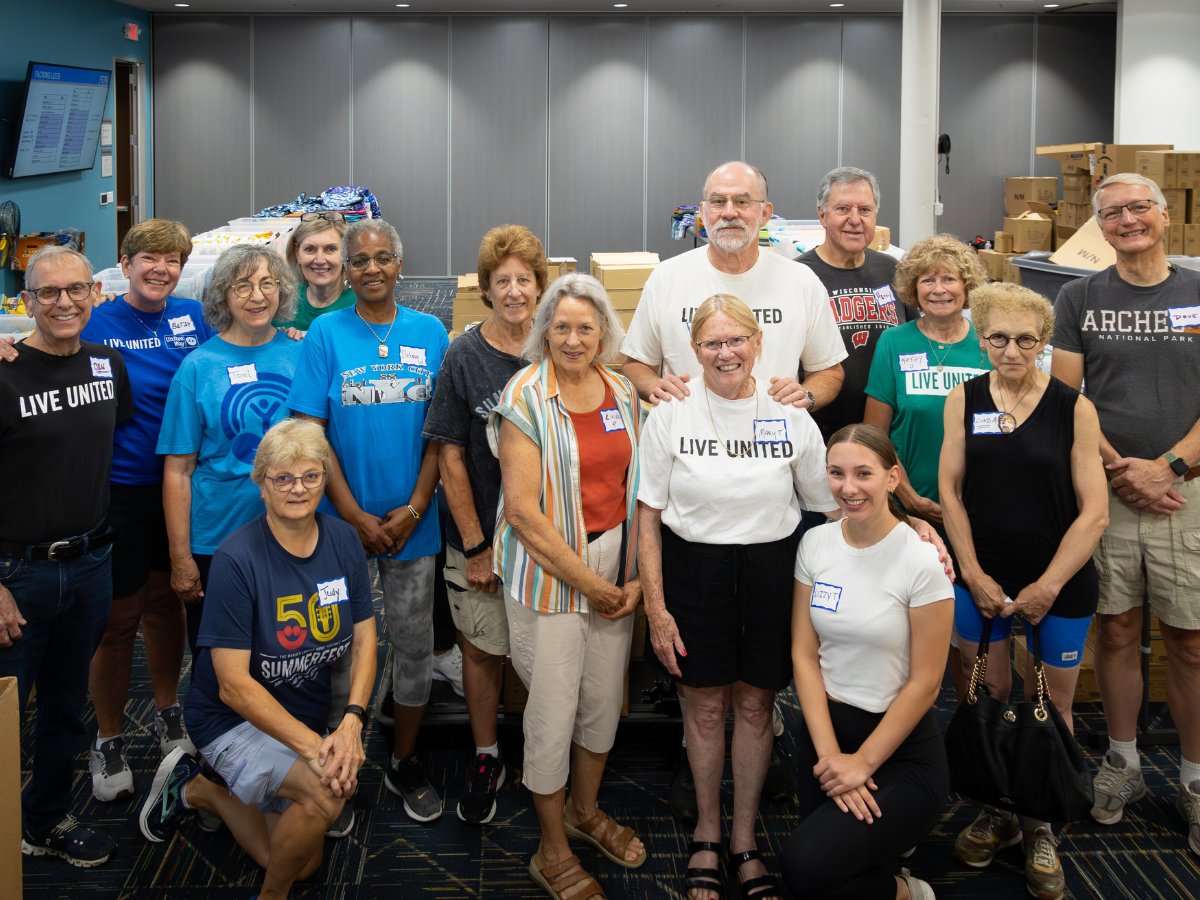 Members of Retire United at a backpack packing event.