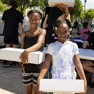 Happy kids with computers