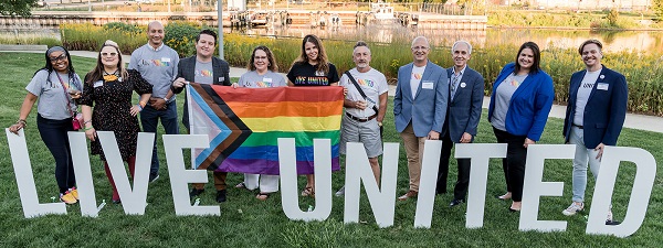 Smiling members of Pride United