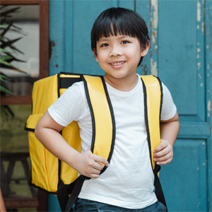 Smiling child with backpack