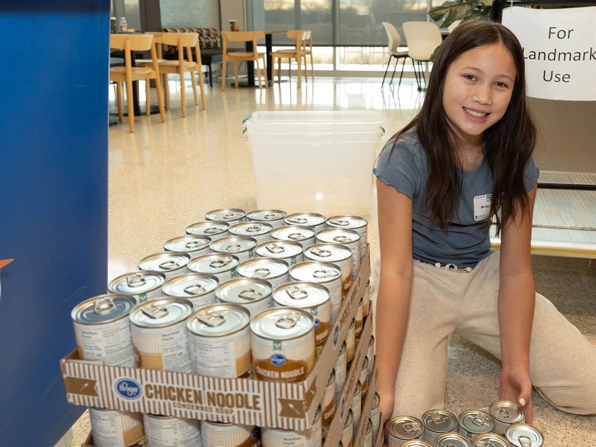 Girl with canned goods