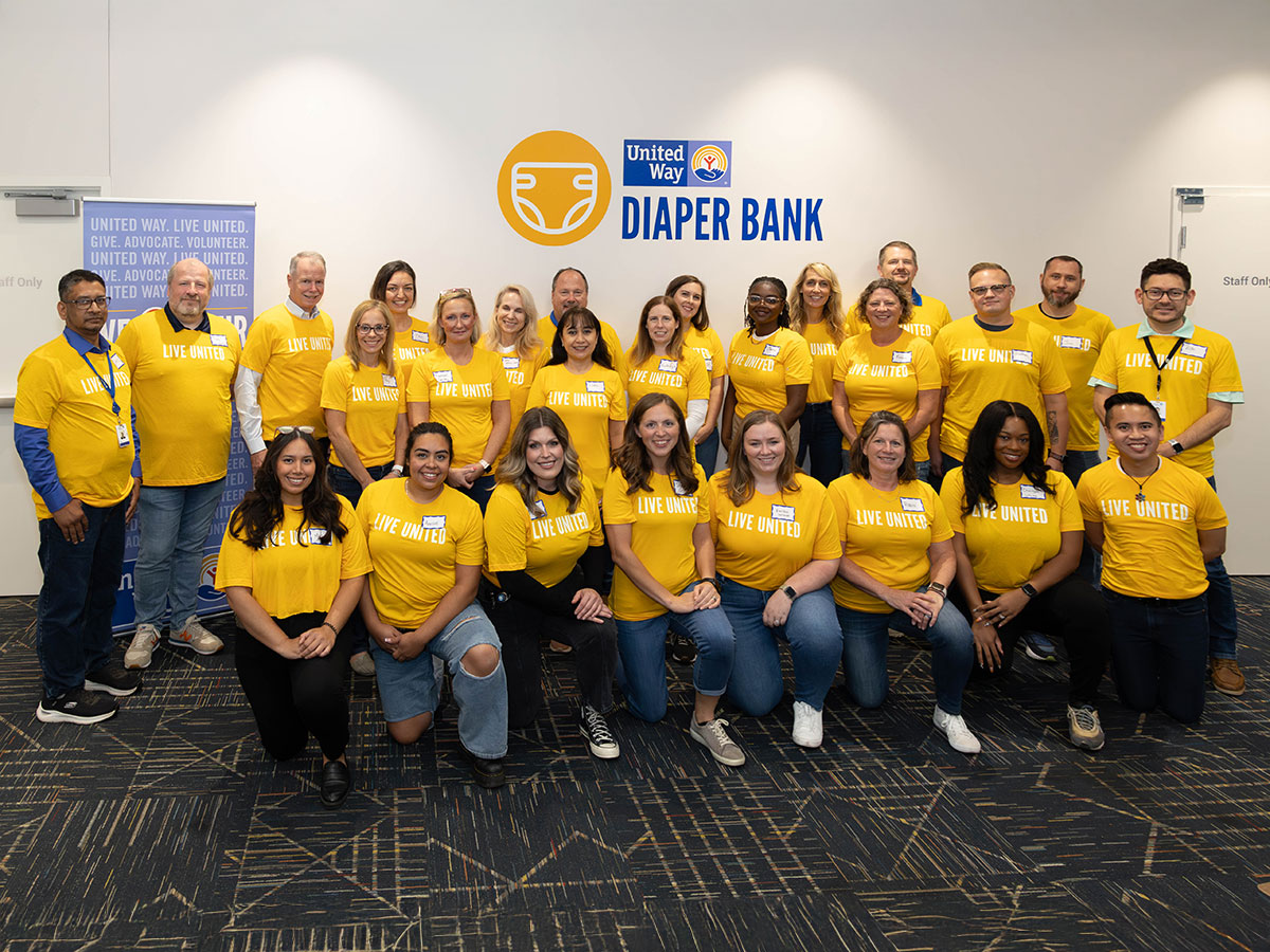 Group of volunteers posing for a photo