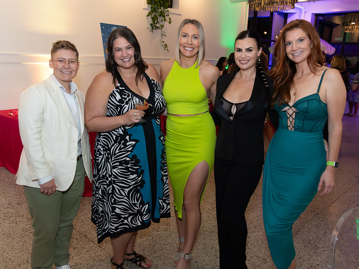 Group of people in formal attire.