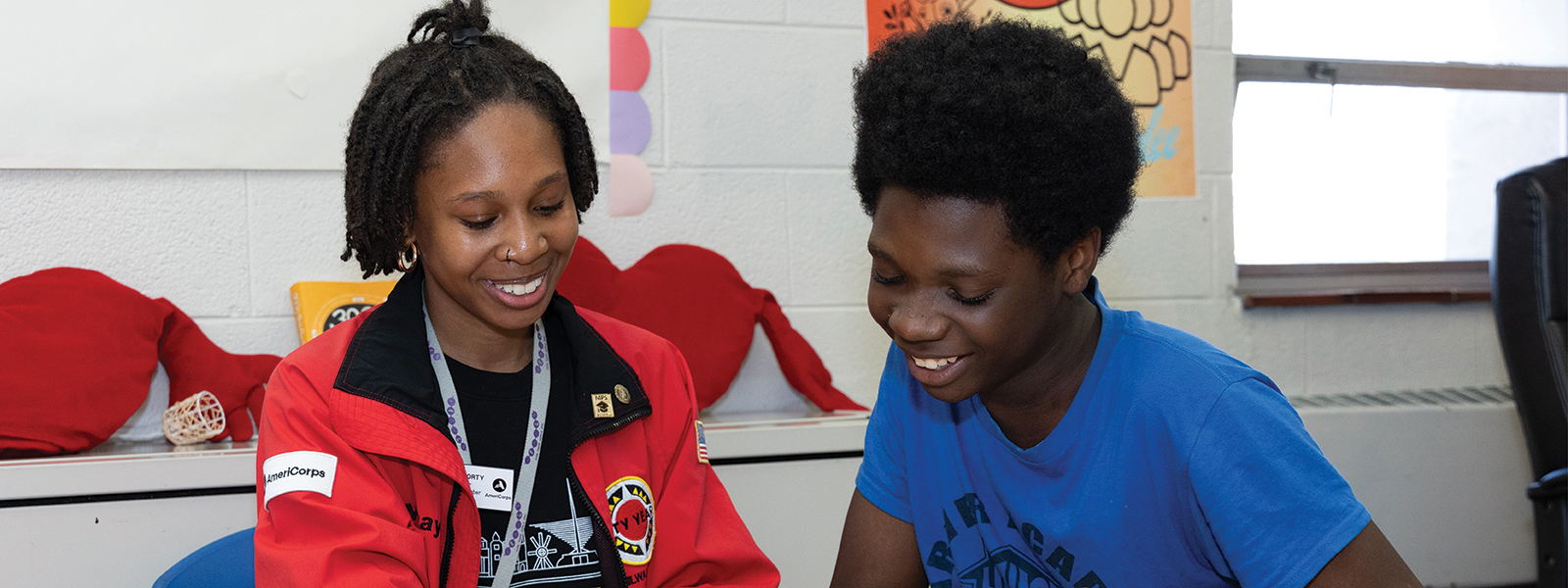 Mikayla helping a student through City Year Milwaukee