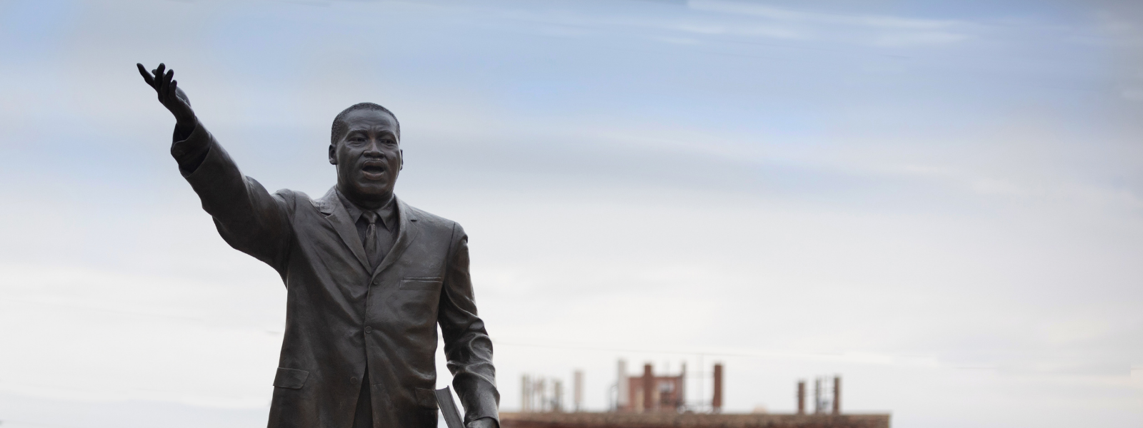 MLK statue with Milwaukee skyline