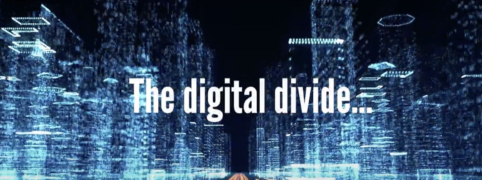computer image with words overlay saying  "the digital divide"