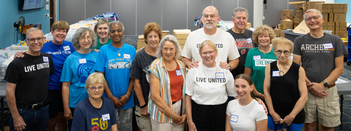 Retire United members at a backpack packing event.