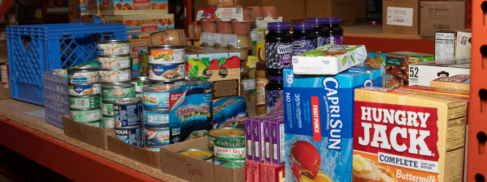 Pantry items on a warehouse shelf at the Salvation Army in Waukesha.