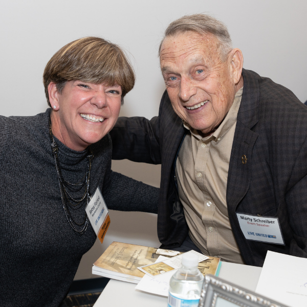 Retire United member with Marty Schreiber at a Retire United event.
