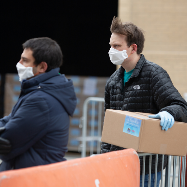 Volunteers masked and volunteering their time for MaskUpMKE