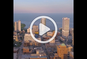 Milwaukee Skyline with overlay play button