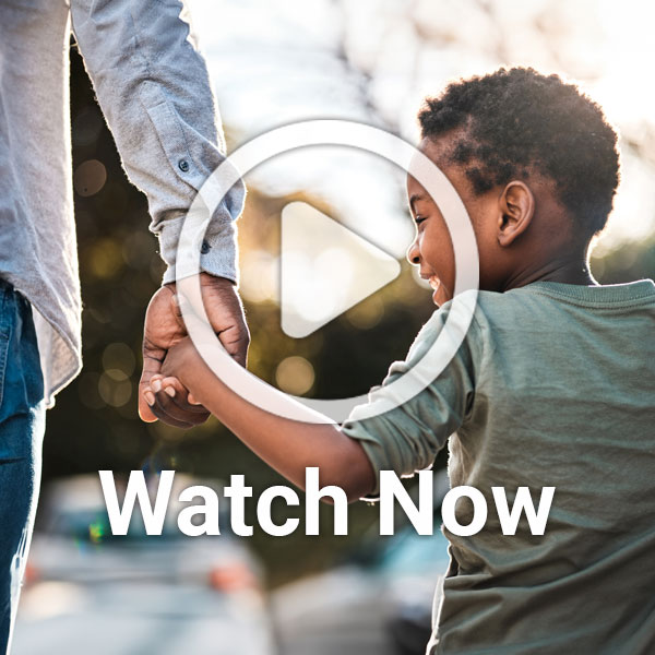 Child Holding Hand Walking with Play Overlay Button