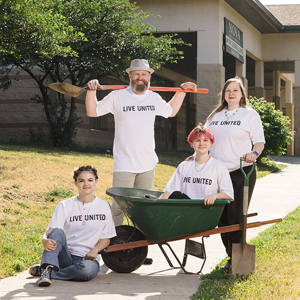 image of family volunteering