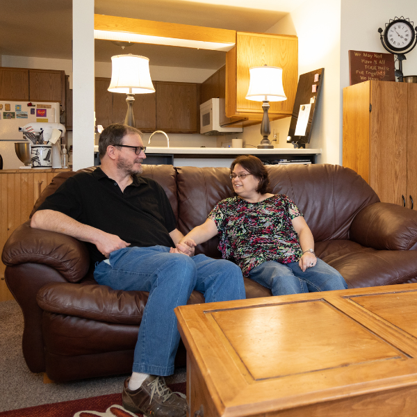 Couple on couch in apartment
