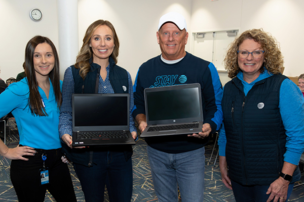 AT&T staff members assist during one of Techquity’s Device Distribution events.