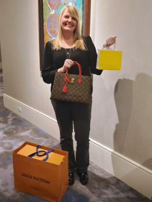 Jennifer with her won auction item